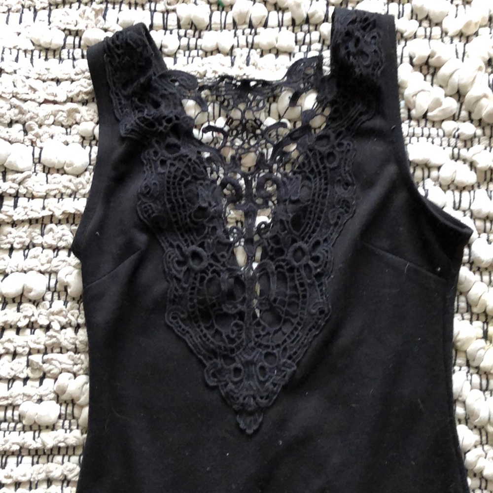 Little black dress with lace cleavage